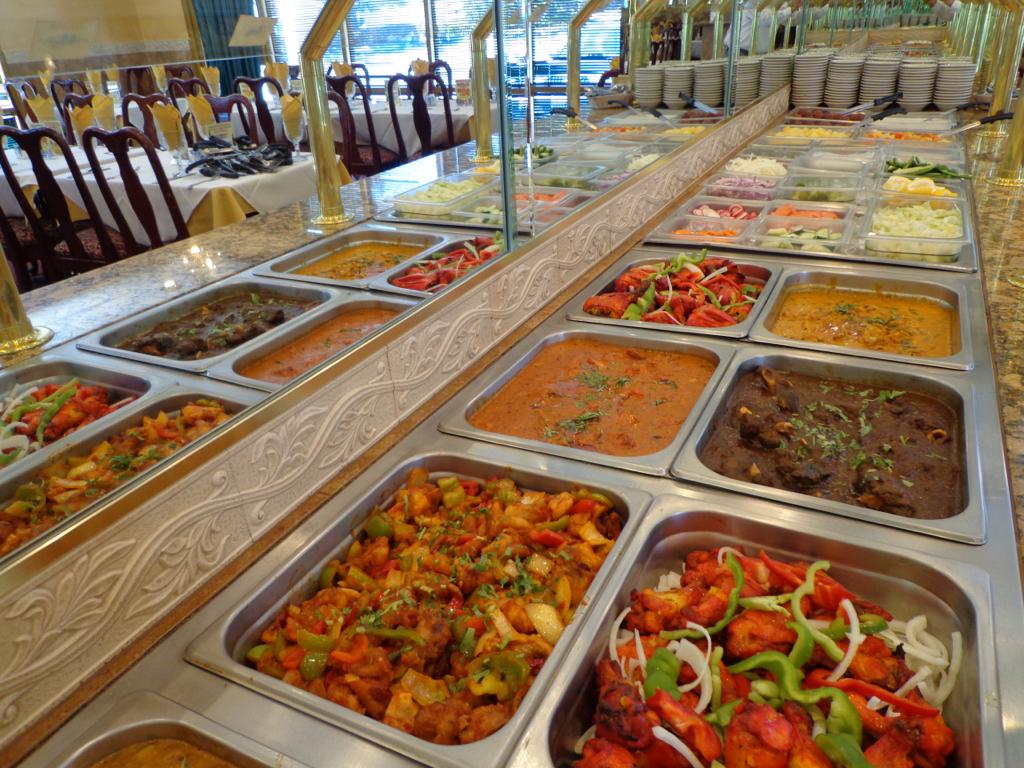 Warm dining room with buffet at Old Barn Restaurant and Bar